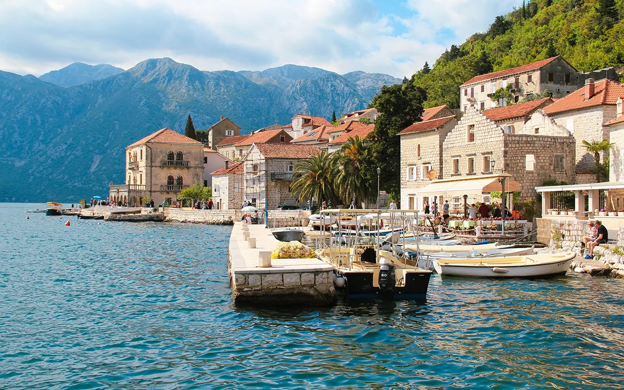 Perast harbour with boats along the waterfront